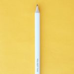 White pencil on yellow background, pencil reads, "You Got This!"