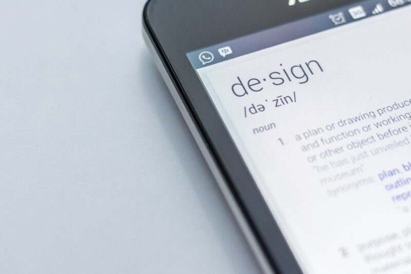 An image of a smart phone showing the definition of the word design.